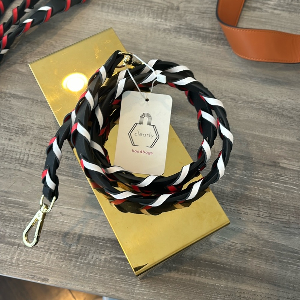 Brand new braided black red white strap.